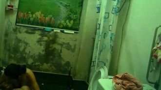 A hidden camera secretly filmed a big-breasted girl taking a bath in the public bathroom of a mixed-gender rental house 1