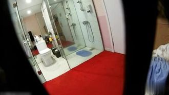 A real candid shot of a model changing clothes and taking a shower! The staff left first and hid the camera in an unexpected corner