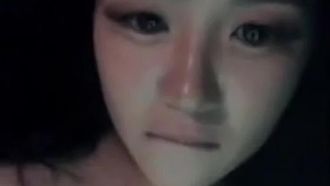 A nice Korean girl had a blowjob outdoors in the car at night, with a vibrator stuffed into her pussy and then a condom, moaning and gasping