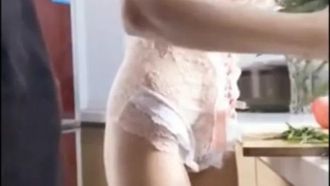A beautiful Internet celebrity with a SEX figure and good looks performs a date with a handsome guy at home for dinner. She is dressed too sexy and the perverted guy has sex with her in the kitchen. She screams that the little cunt is fucked and her dialogue is lewd.